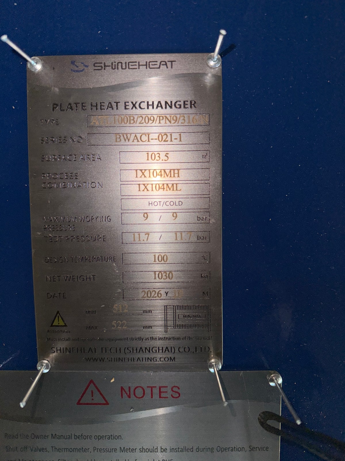 Original SHINEHEAT nameplate photograph for one pre-assembled heat exchanger reference